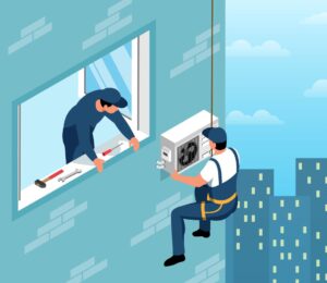 Technician installing an air conditioning unit on the side of a building, while another technician works from inside.
